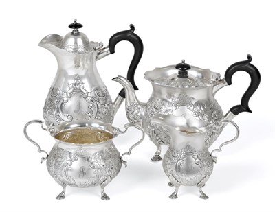 Lot 2120 - A Three-Piece Edward VII Silver Tea-Service and an Edward VIII Silver Hot-Water Jug to Match,...
