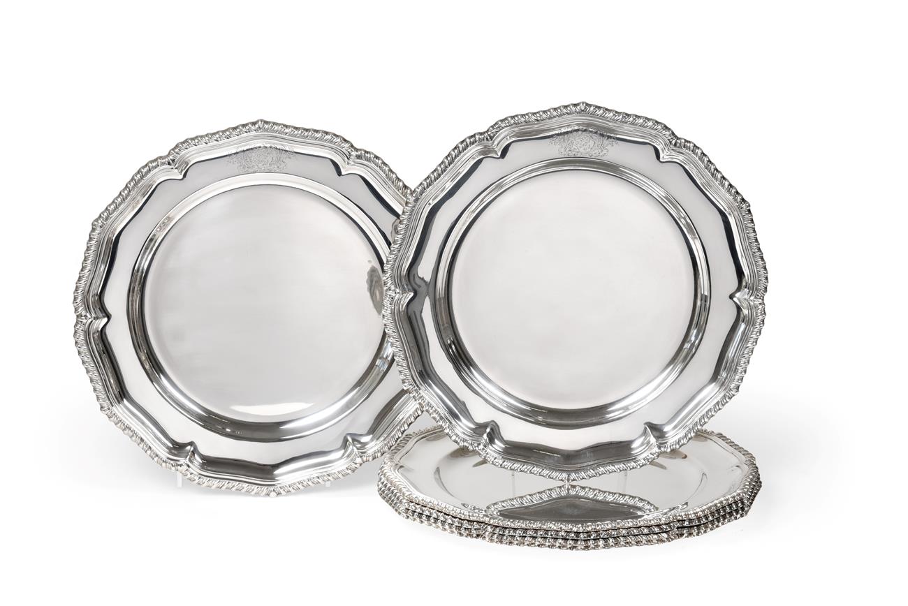 Lot 2127 - A Set of Six Silver Dinner-Plates, Apparently Unmarked, in the George III style, each shaped...