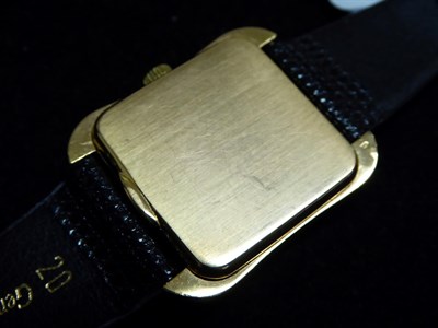 Lot 2169 - An 18 Carat Gold Automatic Centre Seconds Cushion Shaped Wristwatch, signed E Gubelin, Lucerne,...
