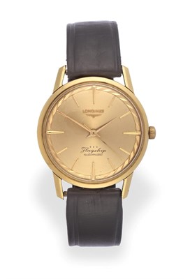 Lot 2180 - An 18 Carat Gold Automatic Centre Seconds Wristwatch, signed Longines, model: Flagship, ref:...