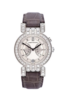 Lot 2186 - A Fine 18 Carat White Gold Diamond Set Automatic Calendar Retrograde Wristwatch, signed Harry...