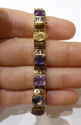 Lot 2217 - A 19th Century Sapphire Bracelet, composed of thirteen graduated vari-coloured and vari-cut...