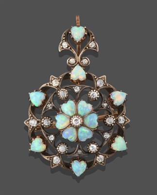 Lot 2219 - A Victorian Opal and Diamond Brooch/Pendant, comprised of an old cut diamond within six...