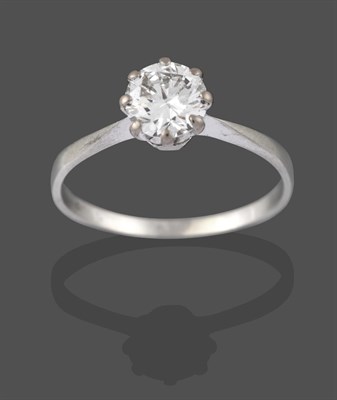 Lot 2220 - A Diamond Solitaire Ring, the round brilliant cut diamond in a white claw setting, to a tapered...