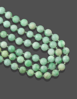 Lot 2224 - A Jade Bead Necklace, one hundred and eight uniform spherical beads knotted as a continuous strand