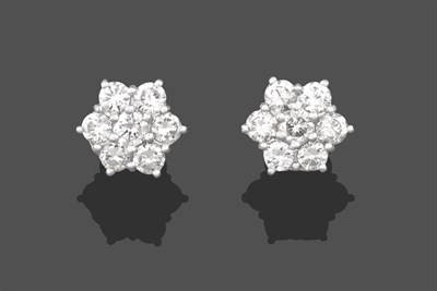 Lot 2234 - A Pair of Diamond Cluster Earrings, the clusters formed of seven round brilliant cut diamonds,...
