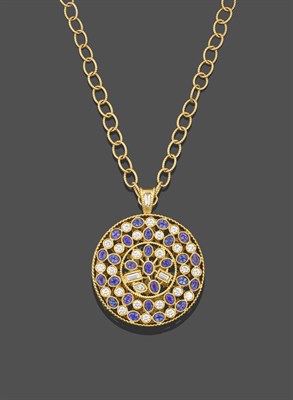 Lot 2251 - A Diamond and Alexandrite Pendant, by Mark Henry, the circular medallion set throughout with...