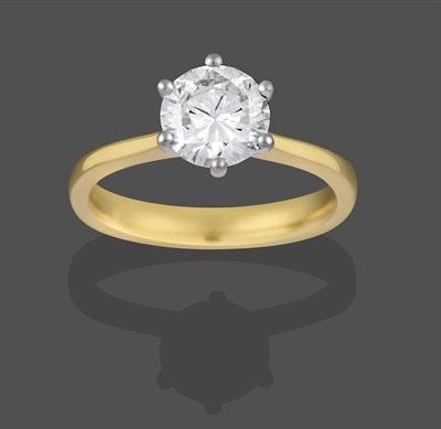 Lot 2253 - An 18 Carat Gold Diamond Solitaire Ring, the round brilliant cut diamond in a white claw...