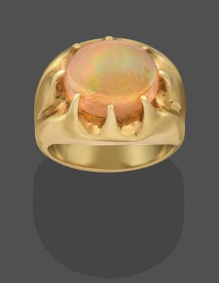 Lot 2254 - An Opal Ring, the oval cabochon opal in a yellow claw setting, to a plain polished shank,...