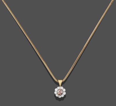 Lot 2261 - An 18 Carat Gold Diamond Cluster Pendant on Chain, the central fancy brownish-pink round...