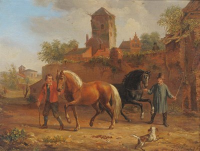 Lot 964 - Jacob Akkersdijk (1815-1862) Dutch Two figures with horses and a dog, with buildings nearby Signed