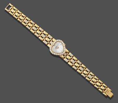 Lot 2268 - A Lady's Diamond Wristwatch, by Piaget, the heart shaped mother-of-pearl dial with quarter...