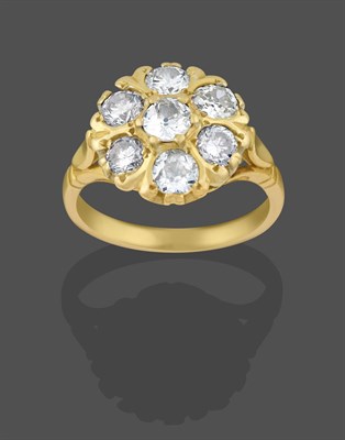 Lot 2277 - An 18 Carat Gold Diamond Cluster Ring, the old cut and eight-cut diamonds in yellow claw...