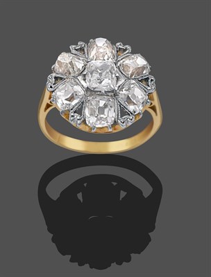 Lot 2286 - A Diamond Cluster Ring, a cushion shaped old mine cut diamond within a border of six cushion shaped