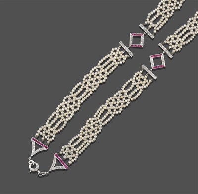 Lot 2290 - An Edwardian Seed Pearl, Ruby and Diamond Necklace, the seed pearls arranged in a geometric...