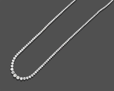 Lot 2306 - A Diamond Rivière Necklace, the graduated round brilliant cut diamonds in white claw settings,...