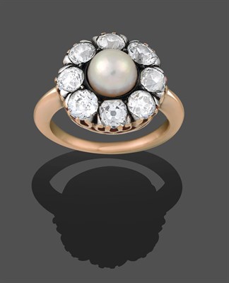 Lot 2312 - A Victorian Pearl and Diamond Cluster Ring, the pearl within a border of old cut diamonds in...