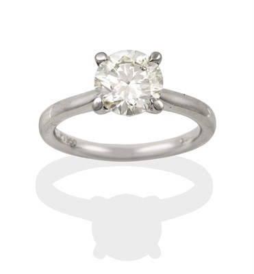 Lot 2318 - A Platinum Diamond Solitaire Ring, the round brilliant cut diamond in a four claw setting,...