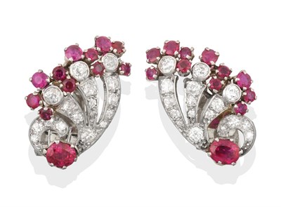 Lot 2323 - A Pair of Diamond and Ruby Ear Clips circa 1925, of stylised fan motifs with floral terminals,...