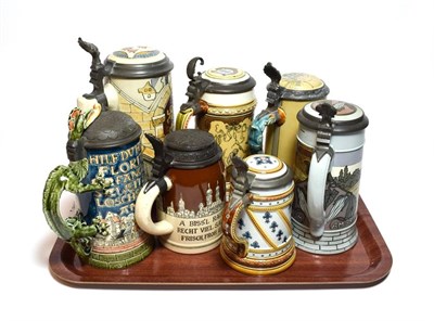 Lot 1 - Mettlach steins including St George with a shaped dragon handle and various others (7)