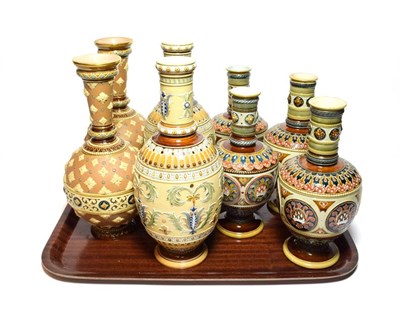 Lot 3 - Mettlach comprising four pairs of traditional style vases, the largest pair 28cm high (8)