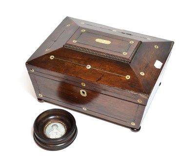 Lot 29 - A 19th century rosewood and mother-of-pearl inlaid sarcophagus shape box with a lift out...