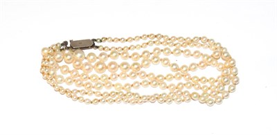 Lot 39 - A two row cultured pearl necklace to a marcasite set clasp, 52.8cm