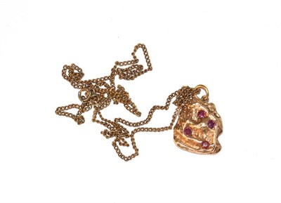 Lot 52 - A 1970's 9 carat gold gem set pendant on a plated chain, pendant length 3.1cm, chain length 62cm