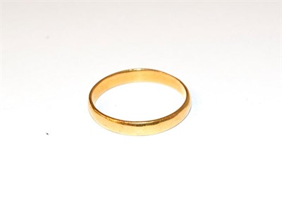 Lot 75 - A 22 carat gold band ring, finger size W