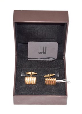 Lot 84 - A pair of cufflinks, stamped '750', retailed by Dunhill