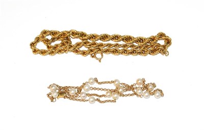 Lot 95 - An 18 carat gold graduated ropetwist necklace, length 43cm; and a trace link chain interspaced...