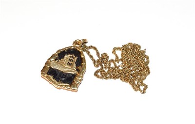 Lot 105 - A 9 carat gold jet pendant on a ropetwist chain, stamped '9CT', pendant length 3.9cm, chain...