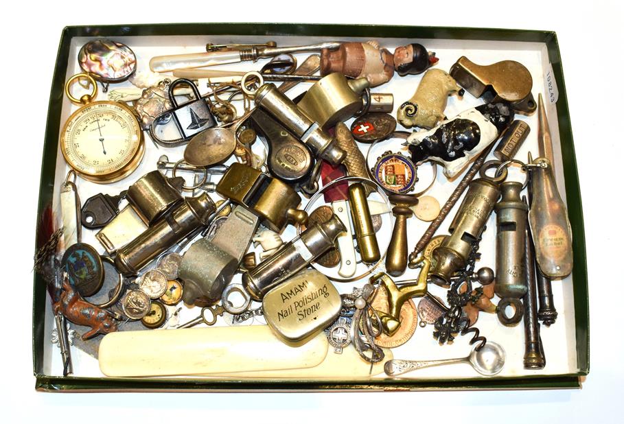 Lot 125 - A small burnished brass pocket barometer and a quantity of bijouterie, whistles, etc