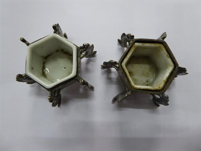 Lot 142 - Two pairs of Chinese export silver saltcellars, each with ceramic liner, together with a pair...