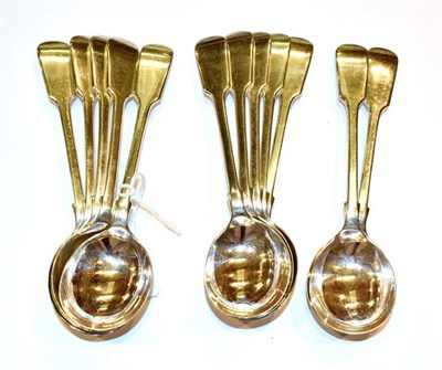 Lot 150 - A set of twelve George V Silver soupspoons, by W. S. Savage and Co., Sheffield, 1930, Fiddle...