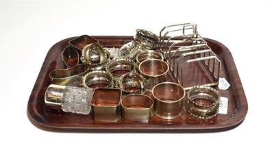 Lot 191 - A collection of silver, comprising a George VI silver seven bar toast rack, by Elkington and...