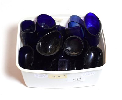 Lot 231 - A quantity of blue glass liners for salt cellars and other dishes in various shapes and sizes