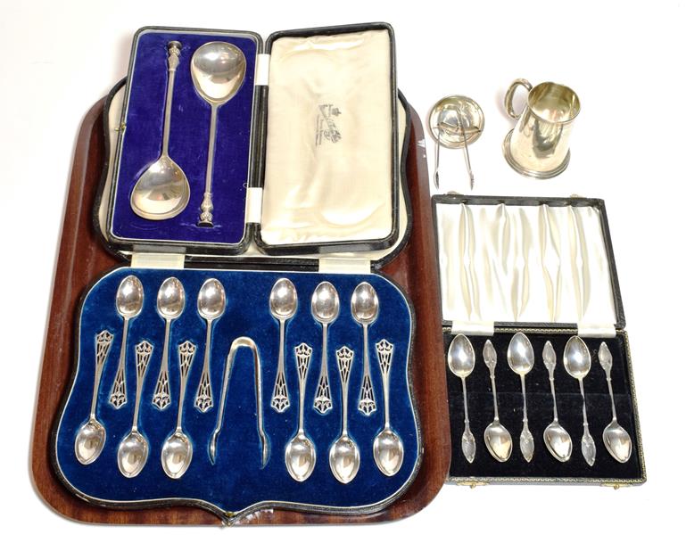 Lot 240 - Three cased sets of spoons, together with a silver mug and a silver ashtray (a.f.)