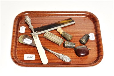 Lot 242 - A collection of silver including an ivory letter opener with silver handle, a steel shoehorn...
