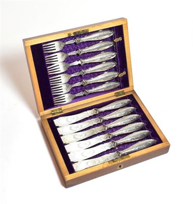 Lot 244 - A rare cased set of Victorian silver fish-eaters, by Martin and Hall, Sheffield, The Knives...