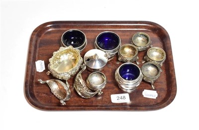 Lot 248 - A group of various silver salt-cellars, including a set of four, by Robert Hennell, London, 1863, a