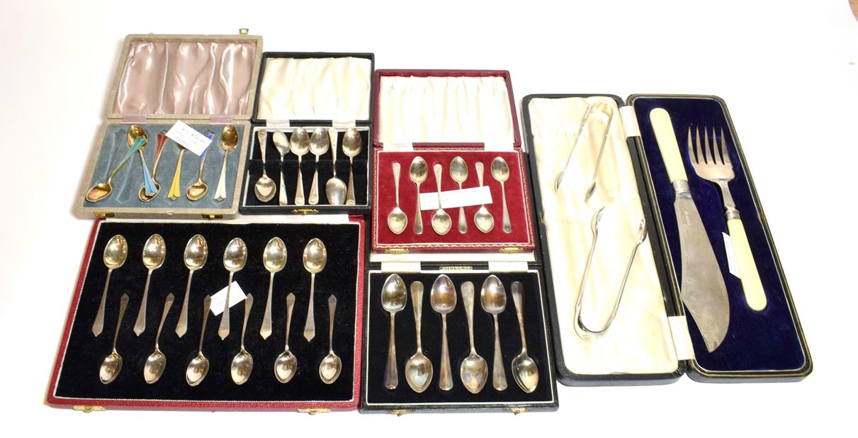 Lot 250 - A collection of silver spoons, comprising three cased sets of six silver coffee spoons, a set...