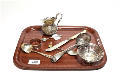 Lot 269 - A collection of silver including, a napkin ring, a Fiddle, Thread and Shell pattern...