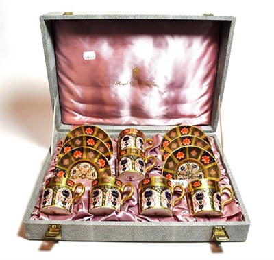 Lot 284 - A cased set of six Royal Crown Derby Imari, coffee set (one cup restored)