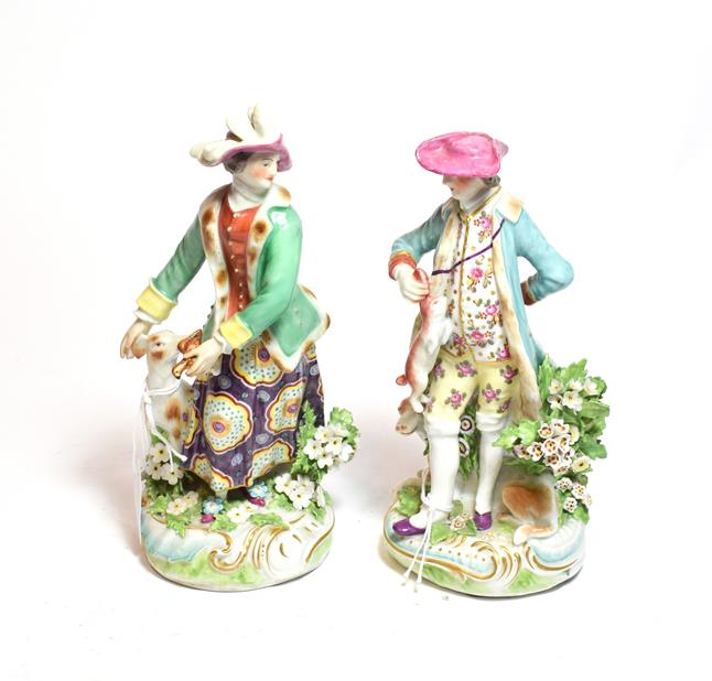 Lot 309 - A pair of 19th century Derby figures with hounds