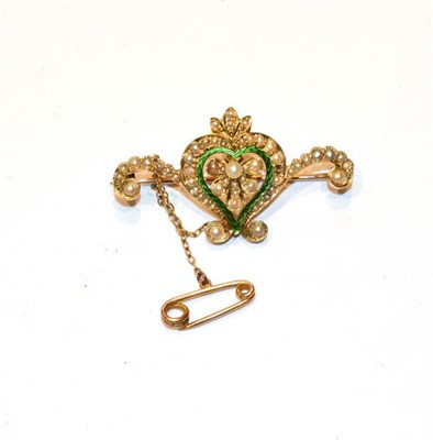 Lot 362 - A seed pearl and green enamel brooch, stamped '15CT' (one seed pearl lacking), length 4.2cm