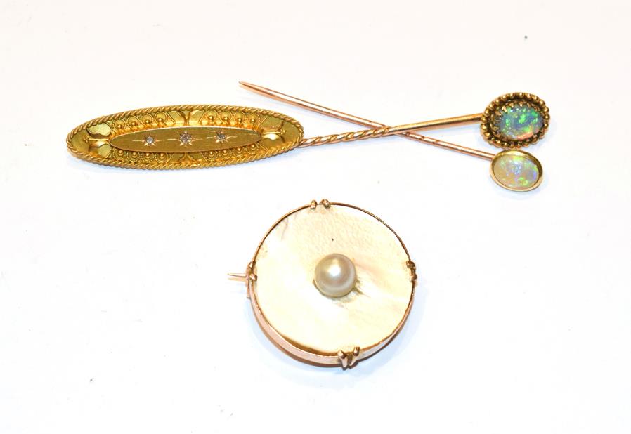 Lot 364 - Two opal stick pins, a 15 carat gold diamond bar brooch, length 4.2cm and a mother-of-pearl and...
