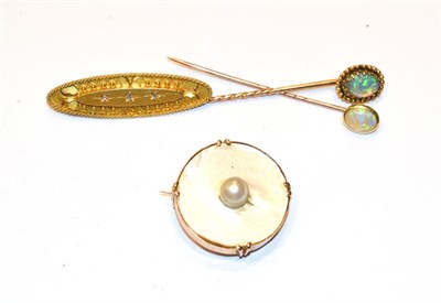 Lot 364 - Two opal stick pins, a 15 carat gold diamond bar brooch, length 4.2cm and a mother-of-pearl and...