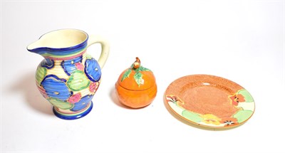 Lot 376 - A Clarice Cliff Bizarre ribbed jug, in the Chintz pattern, 17cm height, together with a side...