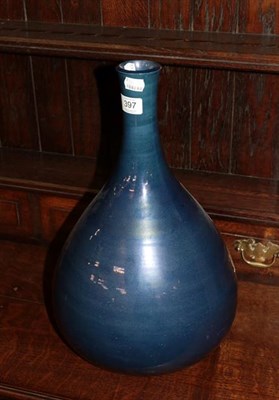 Lot 397 - Tobias Harrison a large blue ground lustre bottle vase signed to base R479, 43cms high
